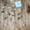 Waterfall Leaf Necklace – Long Layering Chain with Cascading Silver & Mixed Metal Leaves