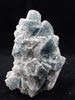Crowned in Frost: Octahedral Blue Fluorite on Candle Quartz